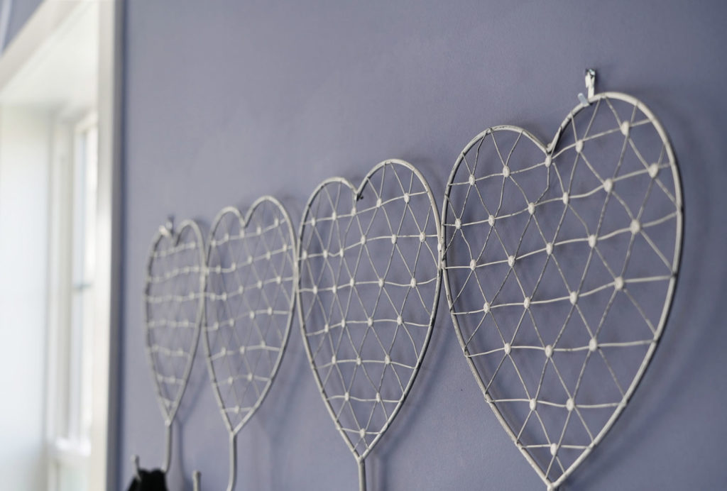 Decorative hanging silver heart shaped coat hooks